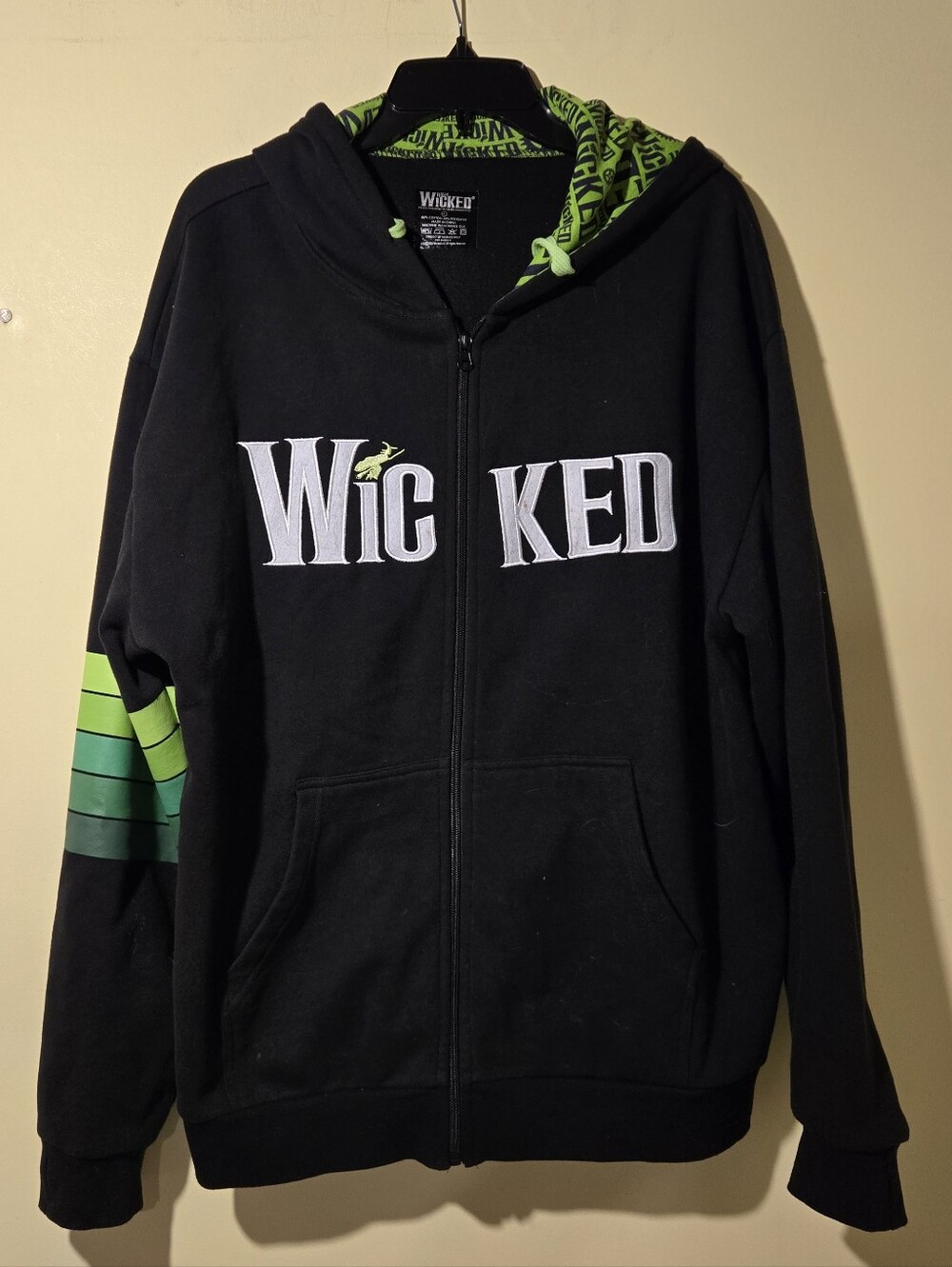 Disney Wicked Black Zip-Up Hoodie with Lime Green Accents.